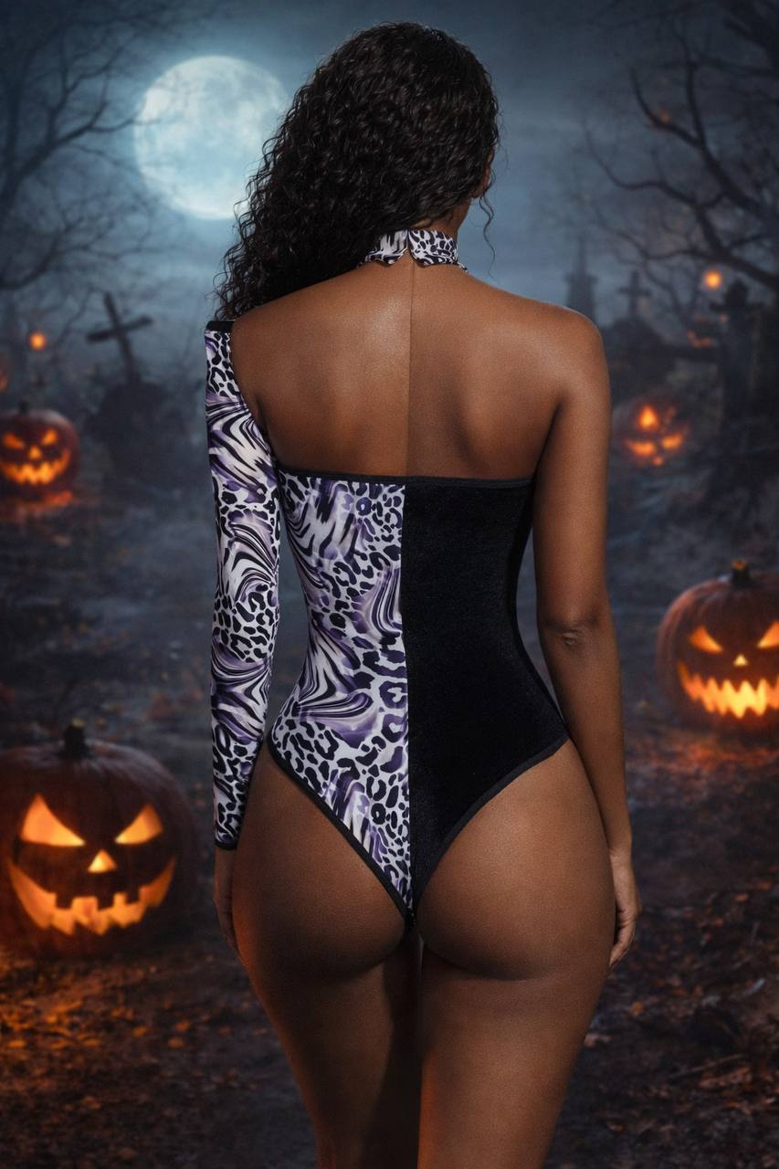 Asymmetrical black and animal‑print bodysuit with one sleeve and choker neckline, Cruella‑inspired villain fashion look