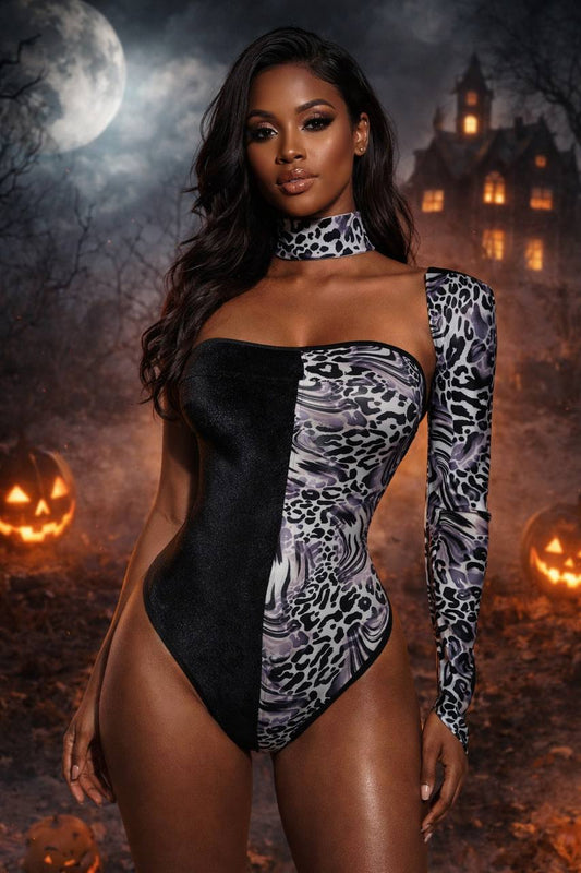 Asymmetrical black and animal‑print bodysuit with one sleeve and choker neckline, Cruella‑inspired villain fashion look
